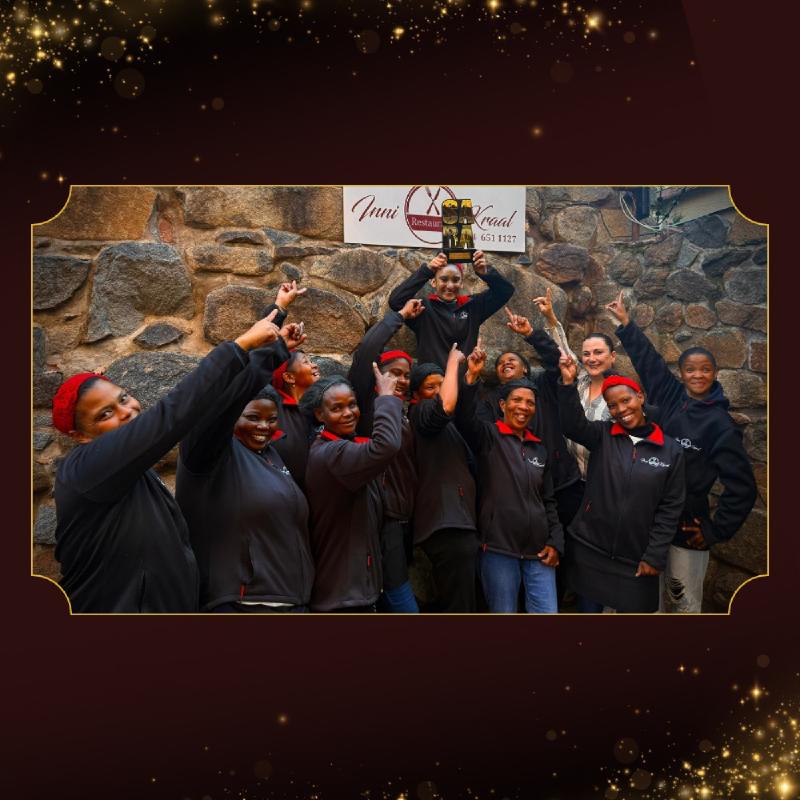 The Inni Kraal team celebrating their SARA win outside the restaurant