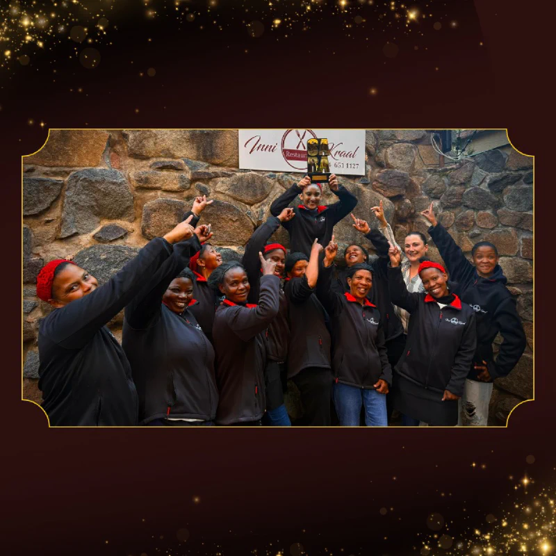 The Inni Kraal team celebrating their SARA win outside the restaurant